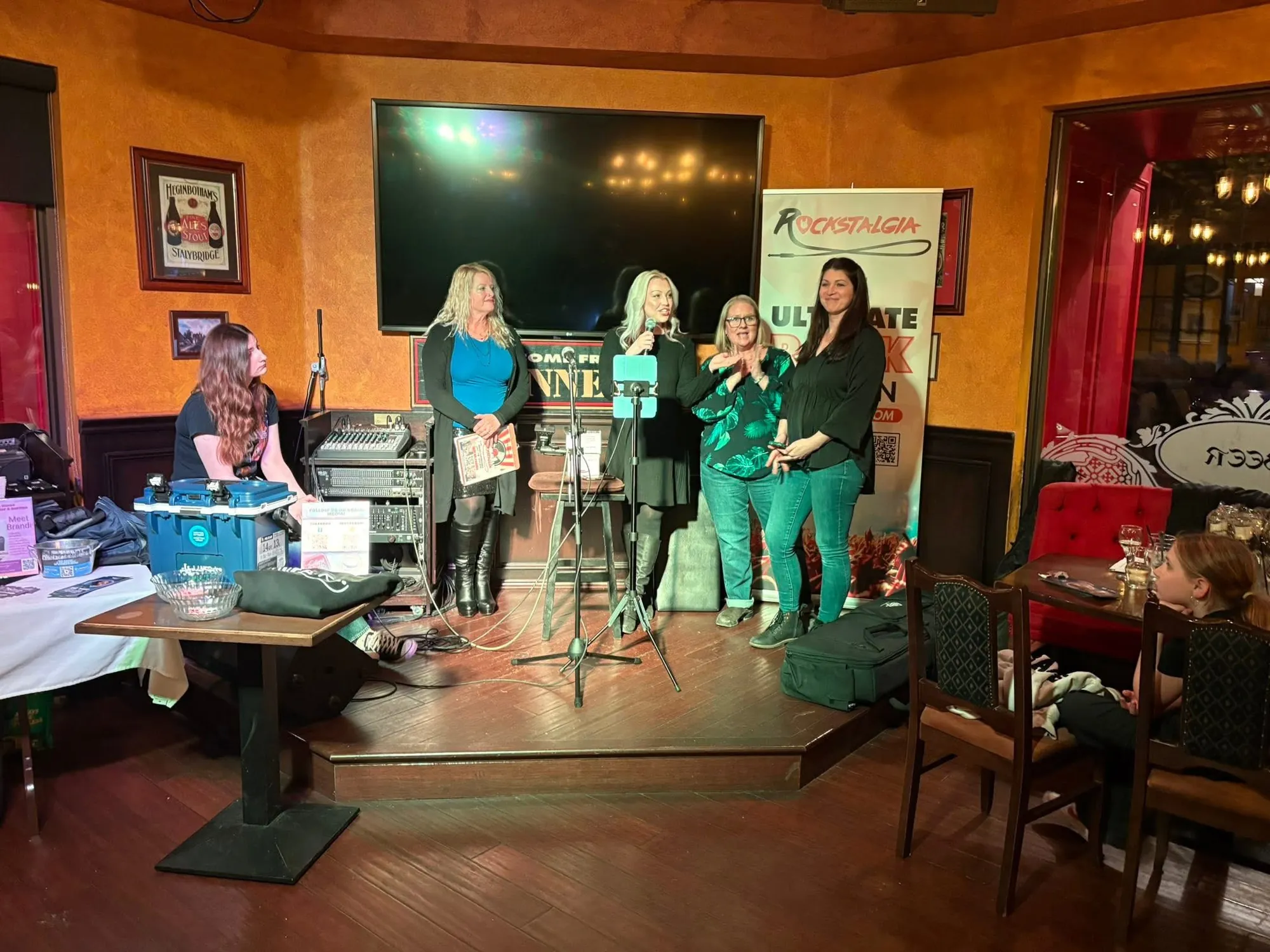 Performers on stage at She Rocks